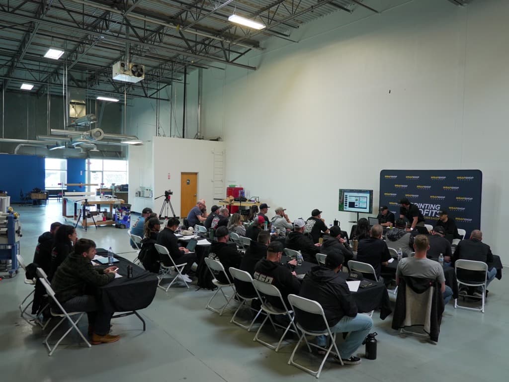 Workshop room filled with wrap shop owners attending the Printing Profits operations workshop